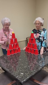Round 2 of balancing the ping pong ball! Who can stack the cups the quickest?! #games #fun #challenge #balance #seniors #seniorliving #assistedcare #community #christian #texas | Christian Care Communities & Services: Mesquite