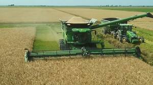 Learn more about the technology that helps John Deere X Series Combines power through rice: https://blog.machinefinder.com/31194/john-deere-x-series-combines | Machinefinder