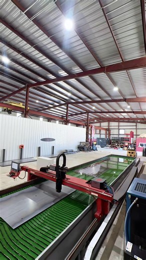 Our plasma burn table is where raw steel becomes purpose-built components for buildings across the country.It’s not just fabrication — it’s the start of a system engineered to integrate seamlessly from design → manufacture → delivery. #DesignManufactureDeliver#ProAmIHS #SteelFabrication #AmericanMade #AviationHangars #ProAmSteel #PlasmaCutting #PrecisionEngineering #ShopFloorPride #BuildingTheFuture | ProAm Steel Buildings
