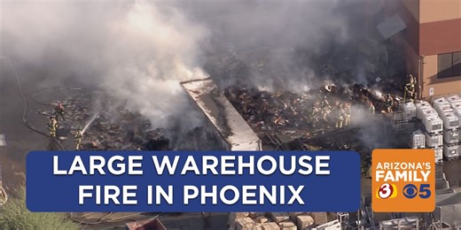 Crews working to put out large fire at Phoenix warehouse
