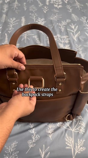 The Gemini Mini is your everyday bag—made to keep up without weighing you down ✨ ⭐ Fits up to a 14” laptop screen size ⭐ Holds a 30oz Stanley with a handle ⭐ 10 thoughtfully designed pockets for easy organization ⭐ Converts from tote to backpack for hands-free wear ⭐ Exterior cup holders to keep spills away from your essentials ⭐ Padded laptop sleeve for extra protection ⭐ Crafted in premium materials Compact, organized, and effortlessly chic—once you switch, you’ll wonder how you ever lived wit