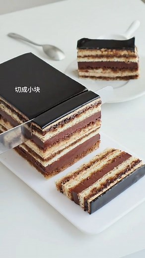 Remy's baking on Instagram: "Opera Cake 歌剧院蛋糕 Today I will share a classic French dessert, Opera Cake, which has a rich taste. Chocolate and coffee lovers should try it ●Ingredients: ◆Joconde sponge cake (2 cakes need to be baked, recipe x2) Baking pan size 28x28cm 2 whole eggs, 78g almond powder, 78g powdered sugar, 105g egg white, 55g fine sugar, 25g low-gluten flour 12g butter. ◆Coffee butter cream: Egg yolk 70g (about 6 eggs), Sugar 70g, Milk 150g, Coffee powder 20g, Butter softened at room 