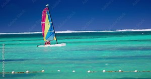 People sailing with catamaran sailboat in caribbean sea, tropical vacation 4k Video