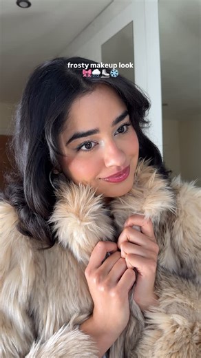 Sophia Pathak on Instagram: "‘I’m cold’ frosty makeup look ❄️ Products used: @pradabeauty prada balm in ‘astral pink’ @armanibeauty cheek tint in ‘sunlit sienna’ @urbandecaycosmetics eyeshadow in ‘cosmic’ @valentino.beauty eyeliner in ‘magnet blue’ @lancomeofficial hypnose mascara in ‘noir hypnotic’ @yslbeauty plumping lip oil gloss in ‘thunder stealer’ @muglerofficial alien EDP #makeup #fragrance #wintermakeup #frostymakeup #coldgirlmakeup"