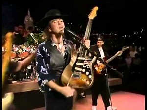 Stevie Ray Vaughan's Roadie Change the guitar during the show