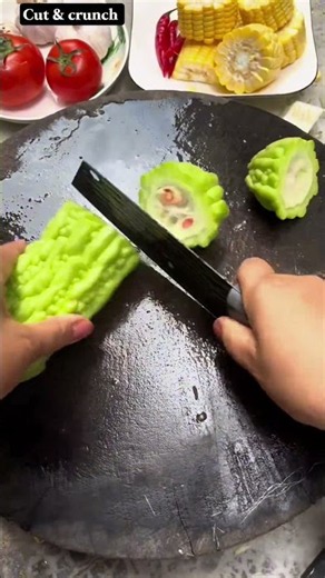 🔪🥒 Bitter Melon Slicing: Sharp Knife Cuts Fresh Gourd Into Even Sections Cleanly