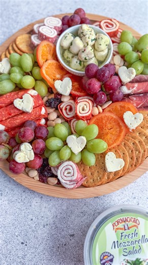 Emily Love Leserman on Instagram: "🧀 A SIMPLE & DELICIOUS CHEESEBOARD🧀 How do you say cheese in Italian? FORMAGGIO!! How can you make a beautiful and delicious cheeseboard using simple ingredients? FORMAGGIO!! This entire cheeseboard is built with @formaggiocheese products — from their creamy Artisan Wraps, to savory Charcuterie Bites, and their bold, flavor-packed Marinated Mozzarella Salad; and were all found in the deli section at Walmart! #ad What do I love most about these products? Forma