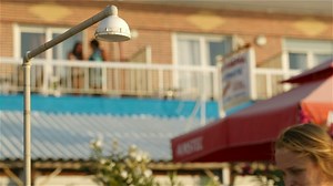 Woman using a beach shower - Free Stock Video