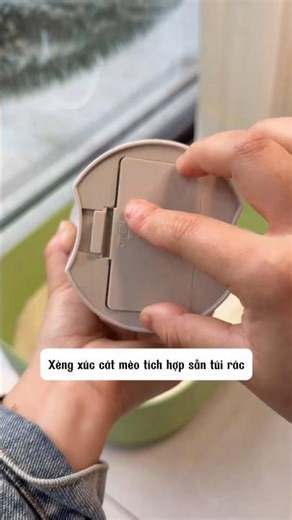 xẻng xúc cát cho mèo cưng