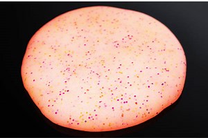 Enchanting Unicorn Putty: Tin of glittery putty that glows in the dark!