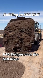 The I-10 bridges over the Salt River safely carry thousands of motorists to their destinations each day. Here, crews with the I-10 Broadway Curve Improvement Project build an Mechanically Stabilized Earth (MSE) wall at the eastbound Salt River bridge for new pavement to match the height of the widened bridge deck. When the project is complete, crews will have widened the east- and westbound bridges by more than 30 feet on each side. | Arizona Department of Transportation