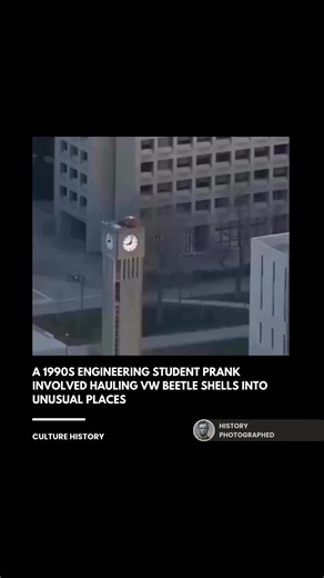 Engineering students from the University of British Columbia spent years hoisting VW Beetle shells onto high-profile landmarks like the Lions Gate Bridge and the university's Ladner Clock Tower. These complex maneuvers involved stripping the cars to their frames and using clandestine rigging techniques to leave the vehicles in gravity-defying positions that baffled the public. Credit: University of British Columbia | History In Pictures