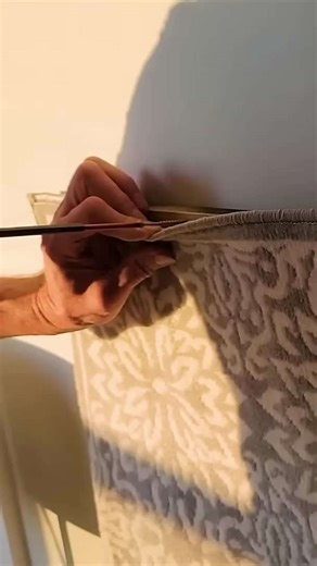 The brilliant new way people are using rugs in their bedrooms (not on the floor!)