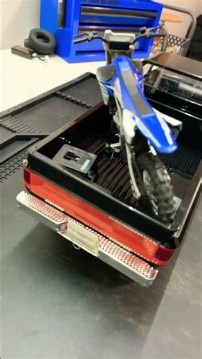 Toy dirtbike fits in the bed