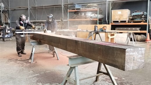 Tuesday Tool Time Talk! Using the "Alaska Mill," a chainsaw with a horizontal guide to cut planks on large timbers. Here we are using it to cut a purple heart timber that will be part of the forward end of the well deck break beam replacement on the 1913 halibut schooner SEYMOUR. | Port Townsend Shipwrights Co-op