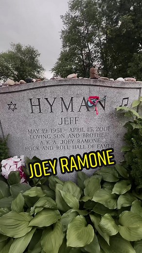 Exploring Joey Ramone's Grave: Faded Kiss Marks Revealed