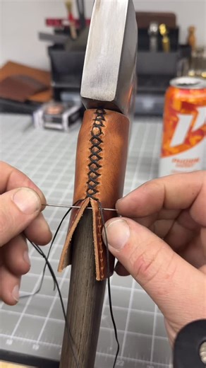 JP Custom Leatherworks on Instagram: "Locked in full Secret Santa mode 🎅🤫 - No spoilers here, we’re keeping every surprise safe until it shows up under the tree. - Until then, enjoy this little teaser - A timelapse of cross-stitch work on an axe handle guard, because even the quiet details deserve their moment. 🔥🪓"