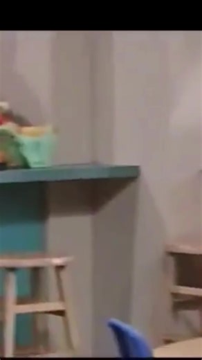 Barney doll in classroom