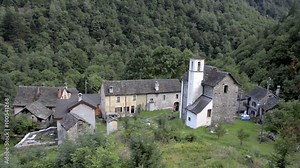 Small forgotten traditional village and church, lost on the Italian Swiss Alps near Locarno.