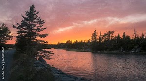 Twilight time-lapse of grand sunset with wide range of dynamic colors at Salt Marsh Trail, Halifax, Nova Scotia