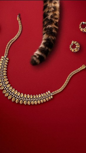 The shining gold creation brings a magical glow to the festive season. | Cartier