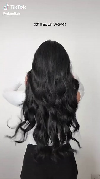 Dreaming of the perfect beach waves but can't decide on the length? 🌊✨ Watch to see the difference between 22 inches & 16 inches of effortless waves! Which vibe is calling you – subtle chic or long and luxe? 💁‍♀️💕 #glamlize #glamlizeextensions #synthetichair #hairextensions #fypシ #beachwaves #wavyhair #beachywaves #messywaves #clipinhairextensions #futurafiber #hairextension #hairtutorial #hairgoals