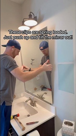 How to remove a builder-grade mirror in your bathroom! #easydiy #diyhome #bathroommakeover