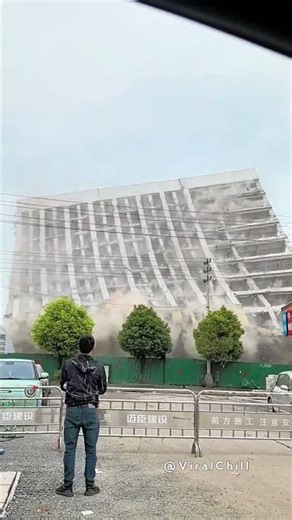 Spectacular Controlled Implosion of a Multi-Story Office Building in an Urban Area