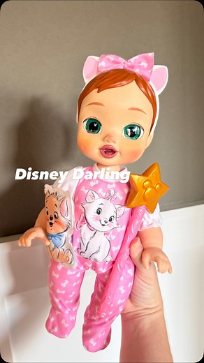 FOLLOW me and comment DARLING for the link✨ These new Disney baby dolls are gorgeous 🥹 There are several different versions to choose from (several are sold out but have been having mini restocks— so turn on notifications!) These are a huge hit this holiday season! You can press the button on their chest, rock them to sleep, tickle, feed them their bottle, and wave the wand over their face for a magical reaction. . . . . . . . #disneyfamily #babydoll #toddlermom @disneyfamily #giftideasforkids 