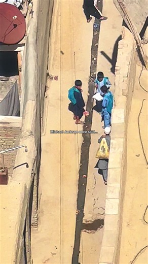 While the three boys carry backpacks - the other boy (same age as them) carries the responsibility of providing for his family. Instead of a backpack he carries a plastic bag with trash that he collected. #healtheworld #michaeljackson #afghanistan