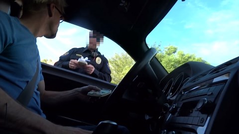 Magician pranks a cop while texting and driving