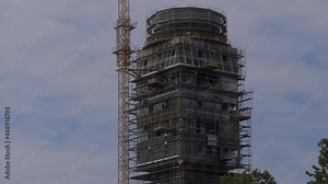 Construction of International airport radar traffic control tower. Air traffic control tower at Belgrade, Serbia airport. Building airport control tower, large modern construction site.Modern Airport