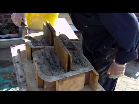 Making concrete retaining wall blocks using Mold Creations Moulds.