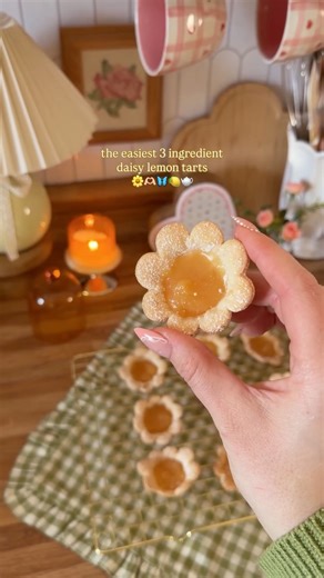 Skyler Mann | Seasonal Home + Cozy Living on Instagram: "only 5 more Sundays til spring 🌼🫶🏻🦋 These daisy lemon tarts might just be my new favorite springy treat! How cute would these be at spring brunches, Easter hosting and picnics! Manifesting spring and warmer weather with these flower tarts! Instructions: -use a flower shaped cookie cutter and premade pie crust -press the shapes into mini muffin pan making sure to press top edges against pan -bake at 375 for about 8-10 minutes until tops