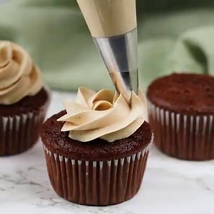 67K views · 140 reactions | The creamiest Peanut Butter Frosting! It's great for cakes, cupcakes, cookies, and brownies. This easy recipe for fluffy peanut butter frosting is incredible with a moist chocolate cupcake!! Get the recipe: https://www.bakedbyanintrovert.com/peanut-butter-frosting/ | Baked by an Introvert | Facebook