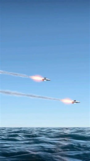 Twin Missiles Locked On Target Over The Ocean.