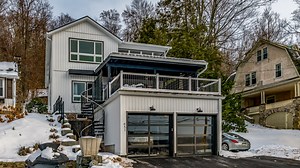 *SOLD* Lakefront Listing! Architectural designed. Renovated home & boathouse. This is one of a kind home offers 4 bedrooms, 2 1/2 baths, terrace with gas fireplace and spectacular views of the lake. Facing west, parking for 9 cars, boathouse with kitchen, 1/2 bath, fireplace, 2 sets of glass garage doors, 50' lakefront deep water. To schedule your showing, call Geri Wisnewski 570-862-7432. List Price $1,600,000. | Lewith & Freeman Real Estate