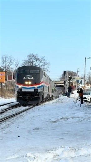 Amtrak 145 flys through Palmer on 449 with the classic clickity clack!