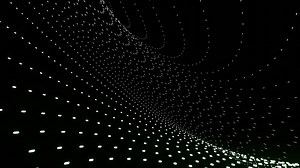 Abstract animation with linear flows from points in space. Design. Curved abstract flow of dots and lines. Points move in linear flow curves