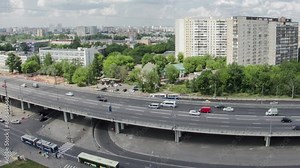 Top view from above of traffic on the elevated avenue road aerial timelapse overpass on Yaroslavl highway in Moscow, Russia. Buses and trolleybuses on the stop Stock Video