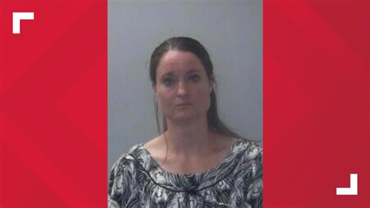 Foster mom accused of lifting children by the ears, slamming the head of one into a wall, records show