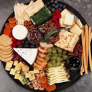 RECIPE: https://www.dinneratthezoo.com/the-best-cheese-board/ A guide to creating the best cheese board with a variety of different cheeses, crackers, fruit and accompaniments. An easy and impressive appetizer for any gathering, and this one always gets rave reviews! | Dinner at the Zoo