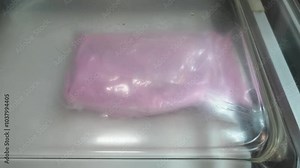 Seal large cuts of meat using black gloves for optimal hygiene. This method ensures freshness and extends shelf life.