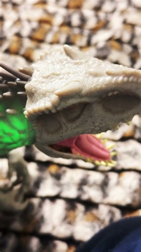 toy and Dominus Rex versus the movie Indominus Rex