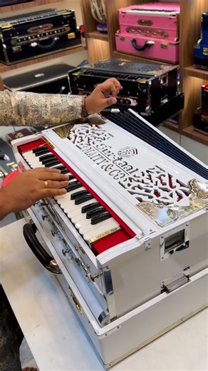 Elegant White Premium Sur Taal Harmonium | 3-Line 9-Scale | Pure Melodious Sound 🎹 Introducing our White Premium Sur Taal Maity Harmonium — crafted for those who value elegance, purity, and unmatched sound quality. Each note resonates with warmth, depth, and the signature Sur Taal craftsmanship loved by top musicians. 🎹 Specifications: • 3-Line, 9-Scale Premium Harmonium • Palitana Mohanlal Premier Reeds for best tonal clarity • Soft, soothing & melodious sound quality • Premium white glossy f