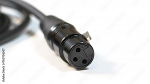 3 pin connection XLR audio cable plug end macro detail, extreme closeup. Professional audio cables and connectors simple concept, nobody, no people. Music production recording studio equipment