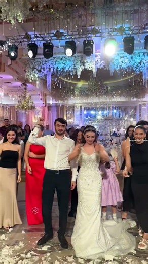 The bride and groom have to break the dishes at the wedding