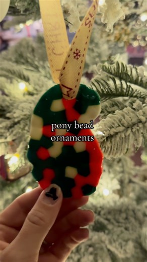 Em on Instagram: "so fun & easy ❤️💚 No house was burned or cookie cutters messed up in the process either 👏 #ponybeadornaments #diyornaments #makingornaments #diyforkids #christmasthingswiththekids"