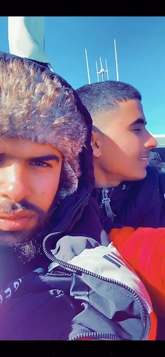 Enjoying a Scenic Boat Ride in Winter Clothing