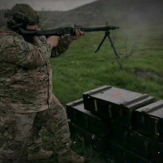 Military Camouflage Shooter Demonstrates Rifle Skills